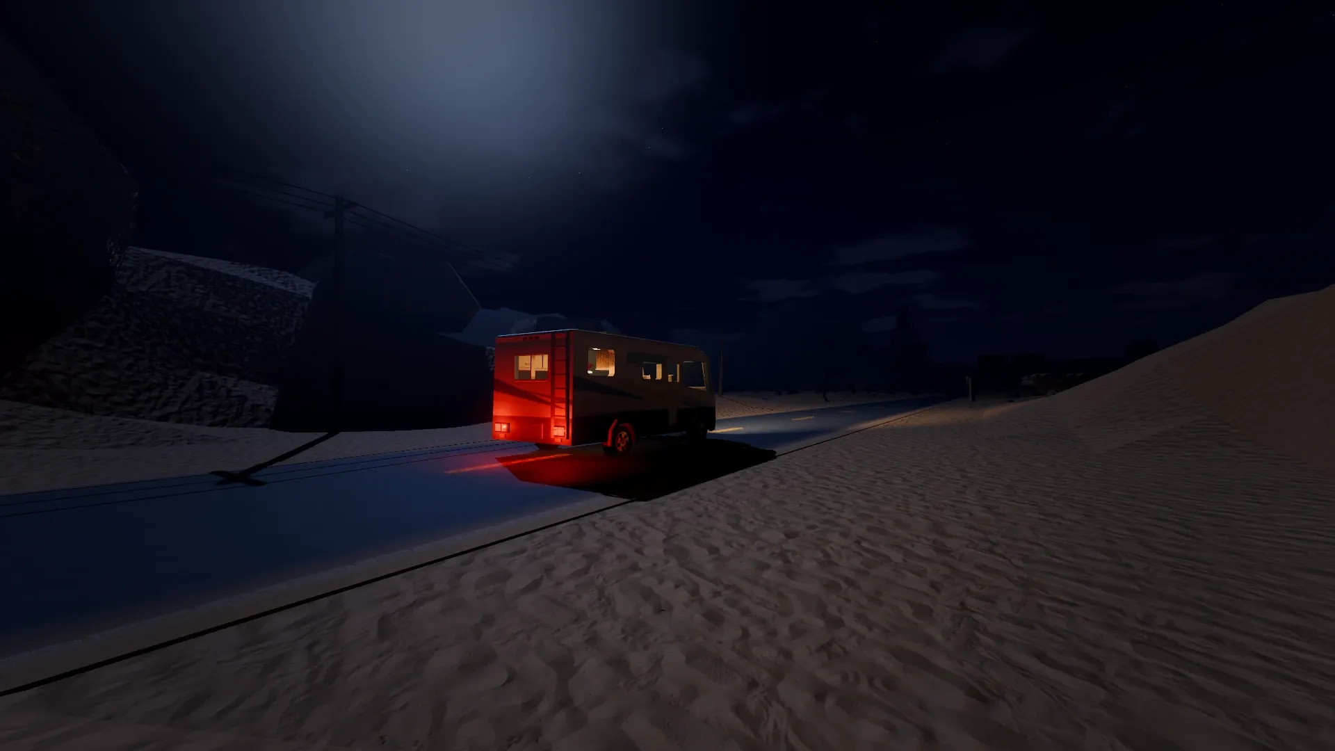 The camper's red tail lights on a moonlit desert highway
